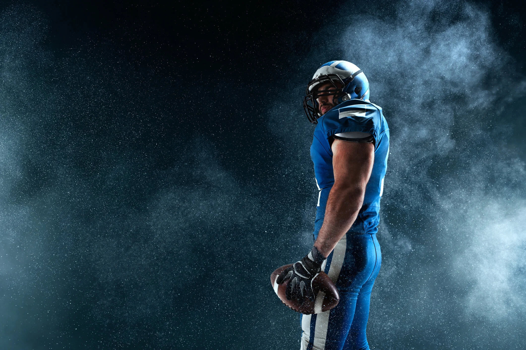 Athlete with football